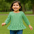 Green Breeze Peplum Top