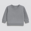 Grey quilted knit sweatshirt with long sleeves and ribbed cuffs for kids